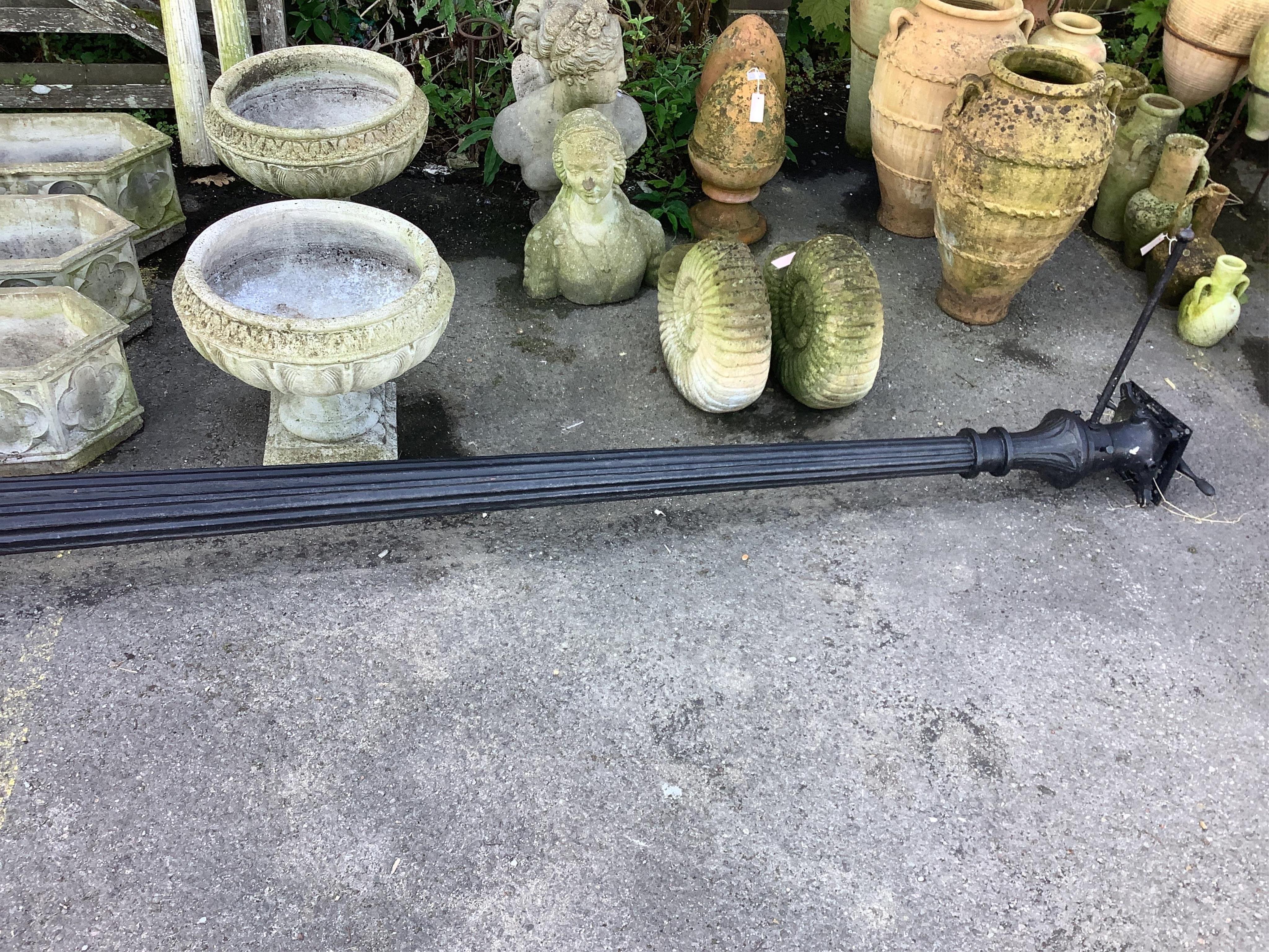 A Victorian style black painted cast iron street lamp, height including base 360cm. Condition - fair